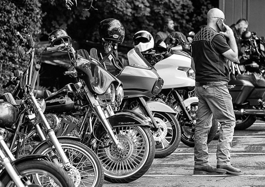 Bikers and motorcycles gathered in Goodview, Virginia, showcasing diverse bikes and styles. for framework The Cultural Distortion Feedback Loop